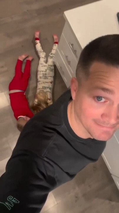 Dad Drags Kids Around Kitchen