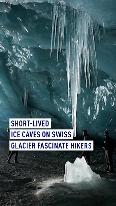 Short-lived ice caves on Swiss glacier fascinate hikers
