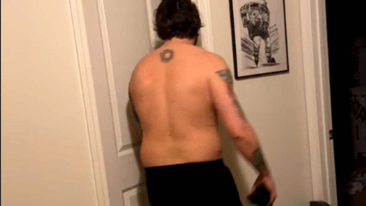 Man opens bathroom door and gets scared as pigeon flies right at him