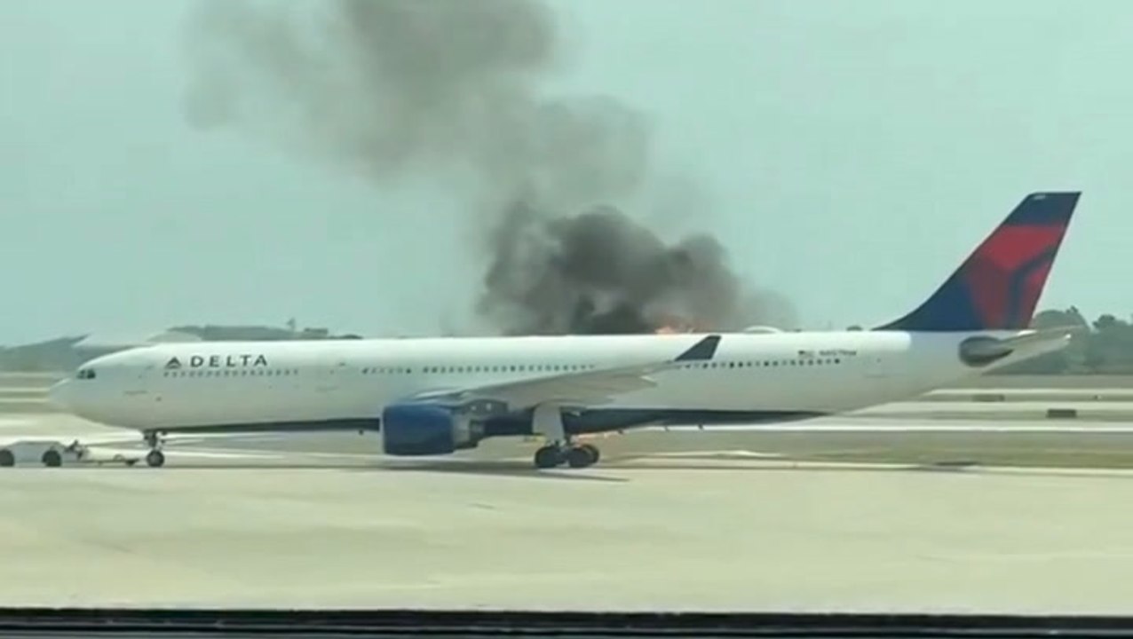 Delta flight with 200 passengers on board bursts into flames shortly before takeoff in Florida