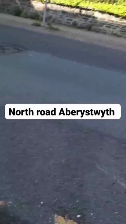 Car flipped upside down in two-vehicle collision in central Aberystwyth