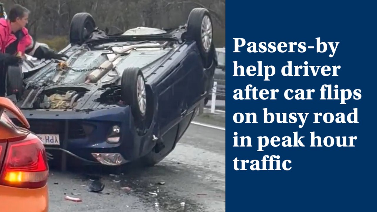 Car flips on busy Canberra road in peak-hour traffic