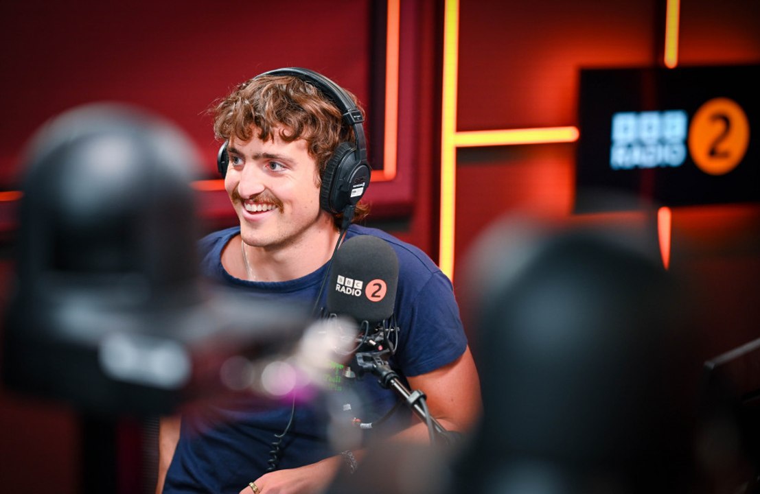 Katy Perry checked in with Benson Boone to see how he was after facing criticism online