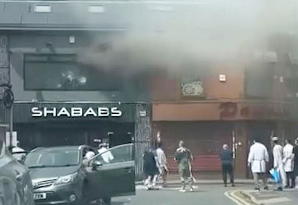Moment hero bystanders help save staff from inferno at famous Birmingham curry house