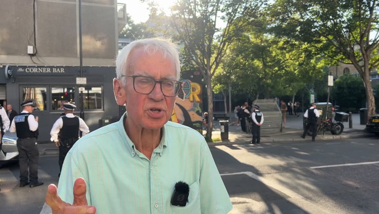 Police outnumber anti-migrant protesters outside Islington hotel