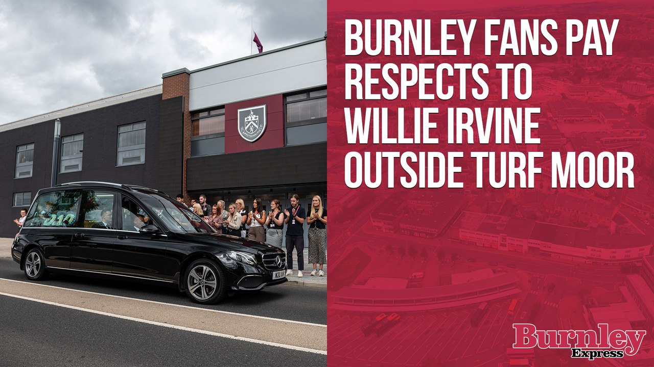 Burnley fans pay respects to Willie Irvine on Harry Potts Way outside Turf Moor
