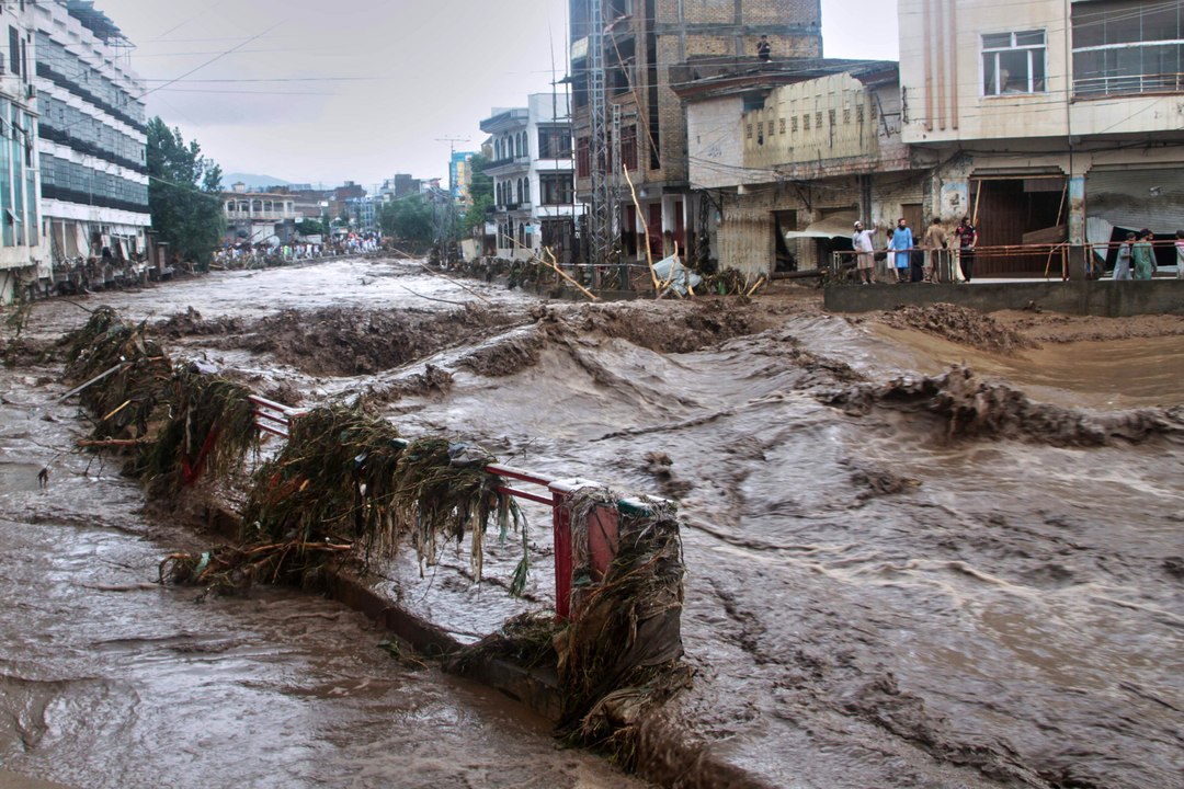 Rescue workers in northern Pakistan after deadly monsoon rains