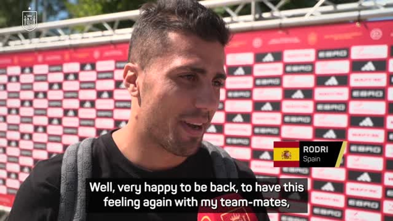 Rodri returns to Spain with a smile after 'tough' year away