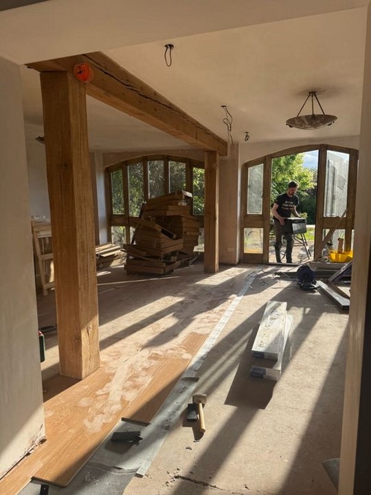 Georgia and Josh work on house renovation