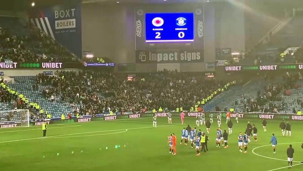 Hibs players applaud away fans at Ibrox
