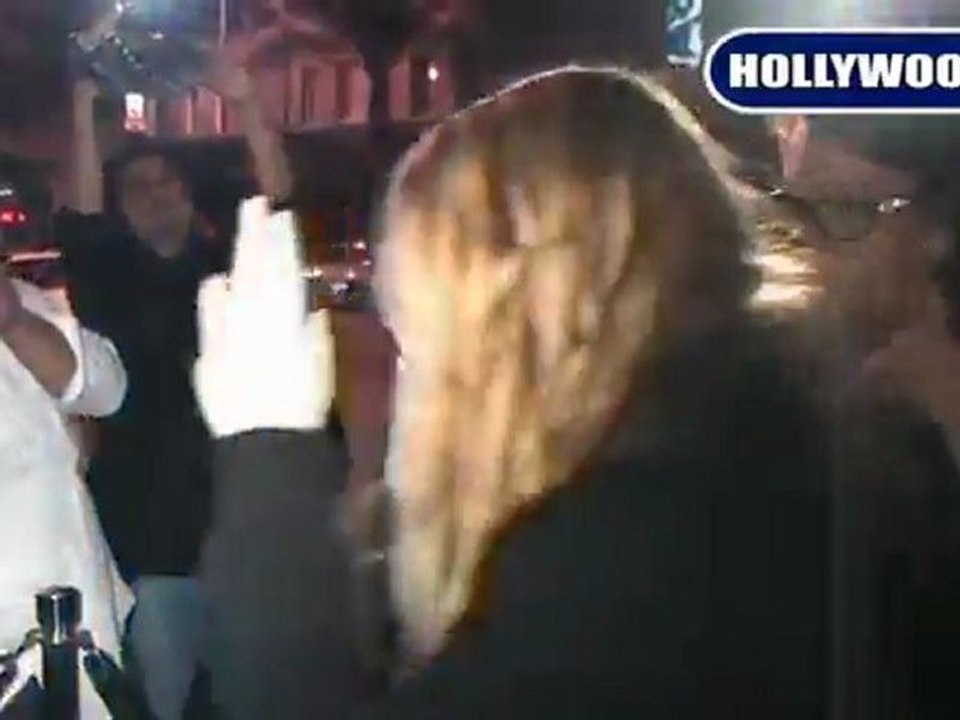 Danielle Riley Keough Hides Her Face At Bar Delux.