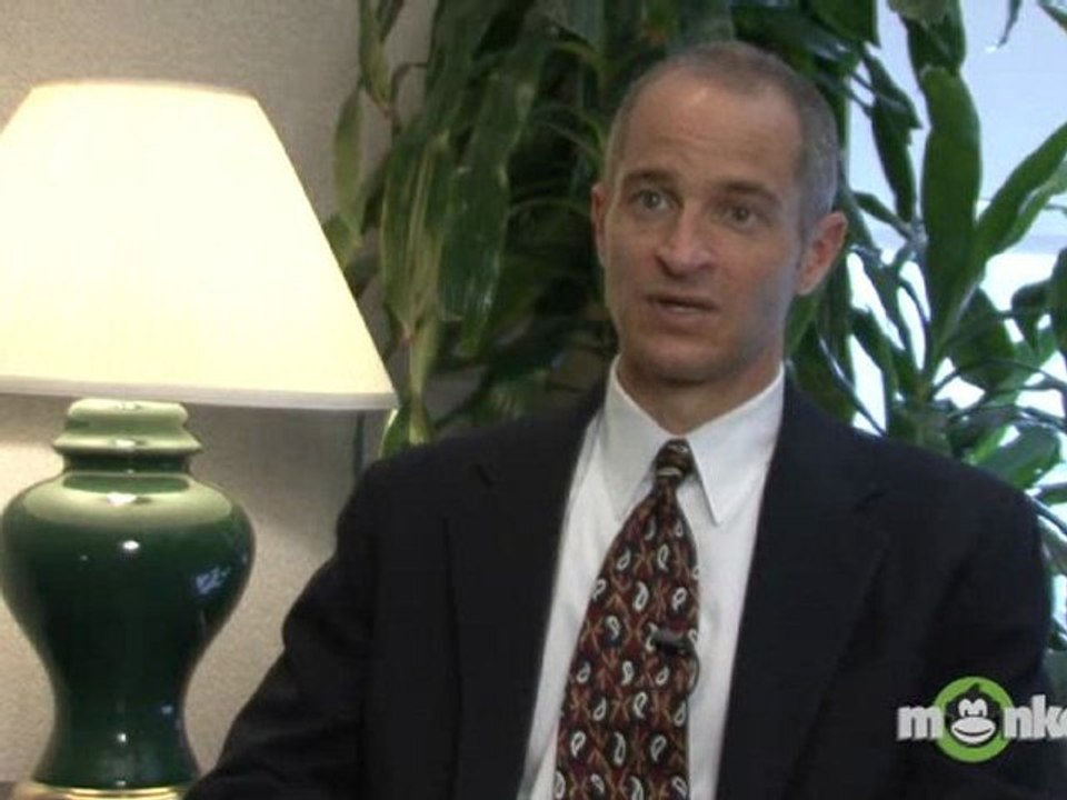 What is the difference between merit & need-based scholarships?