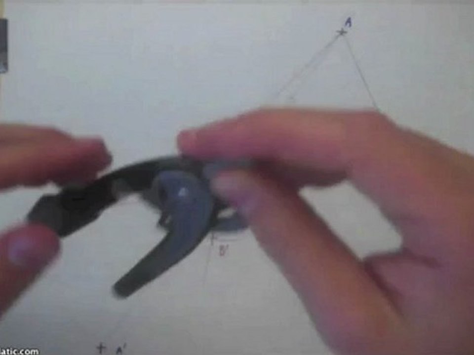 Construction du symétrique central d'une figure avec commentaires