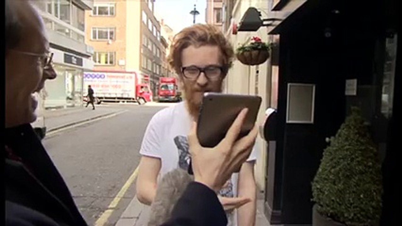 Secrest behind Blue and black dress