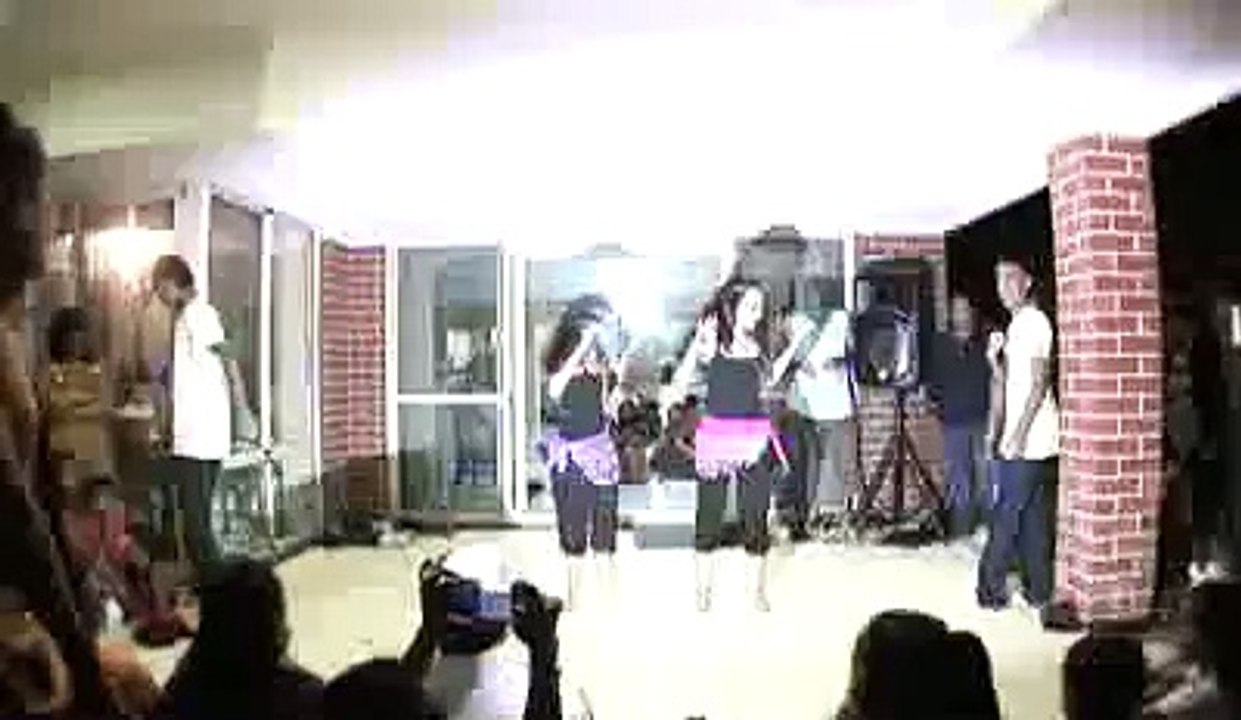 Boys and girls classical dance together