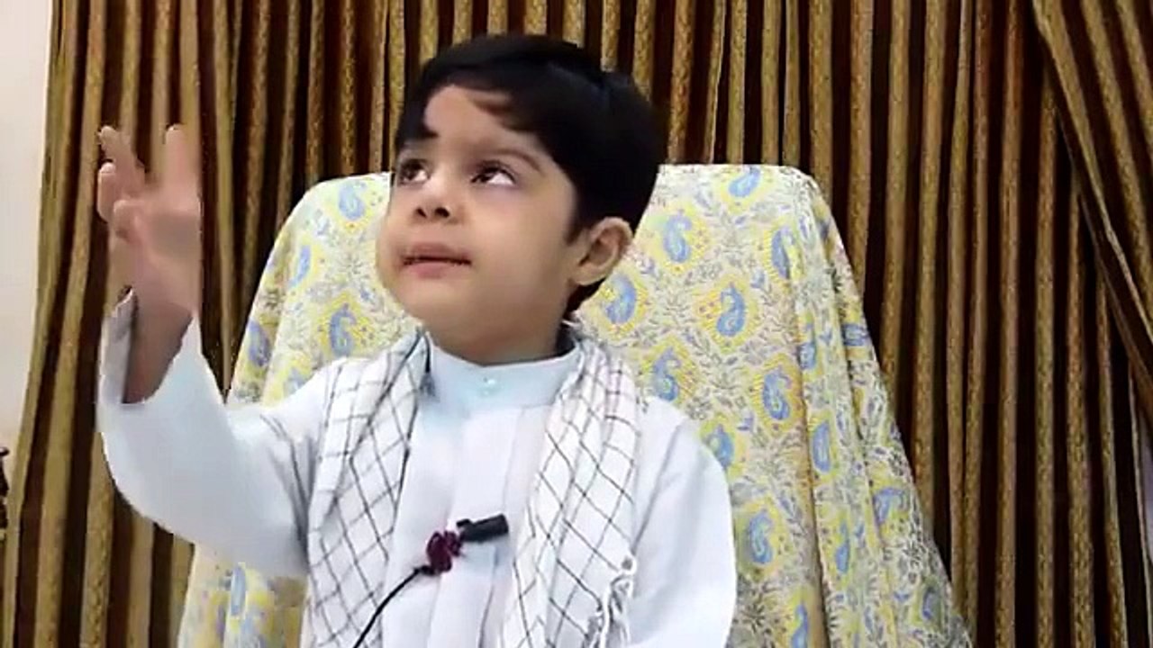 Cute Boy Explaining About Islam