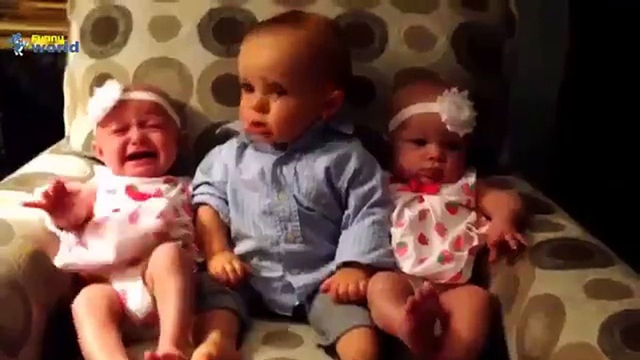 Baby sees baby twins for the first time