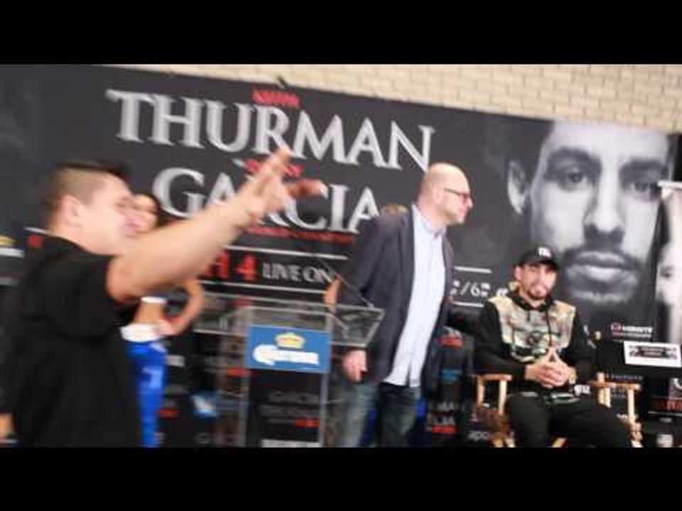 Keith Thurman Dapping everyone up at presser BTS