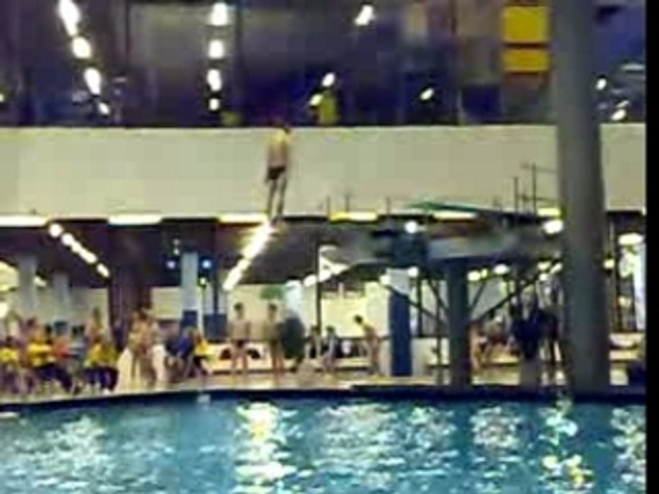 Back 1 1/2 Twist with 1 1/2 Somersault