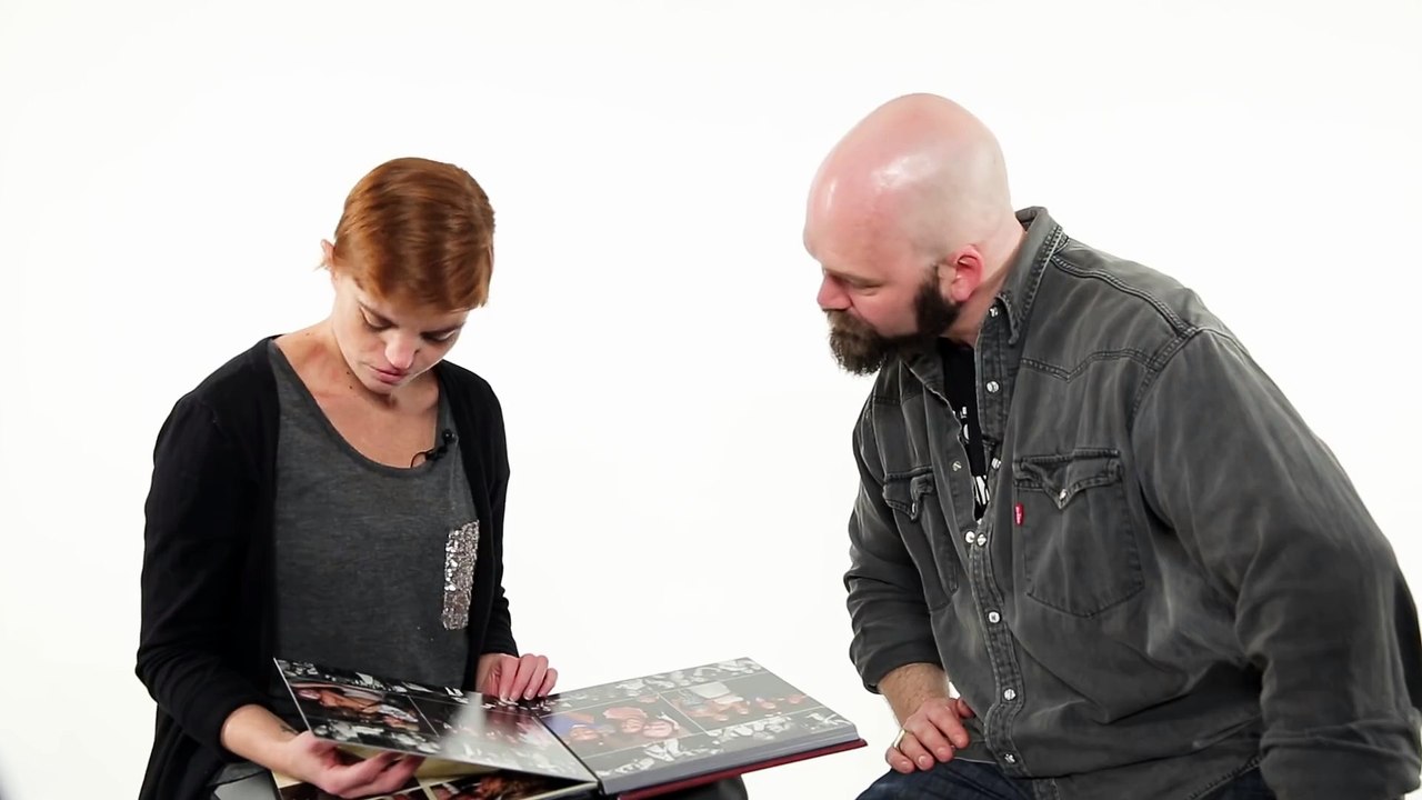 Divorced Couple Looks At Their Wedding Photos