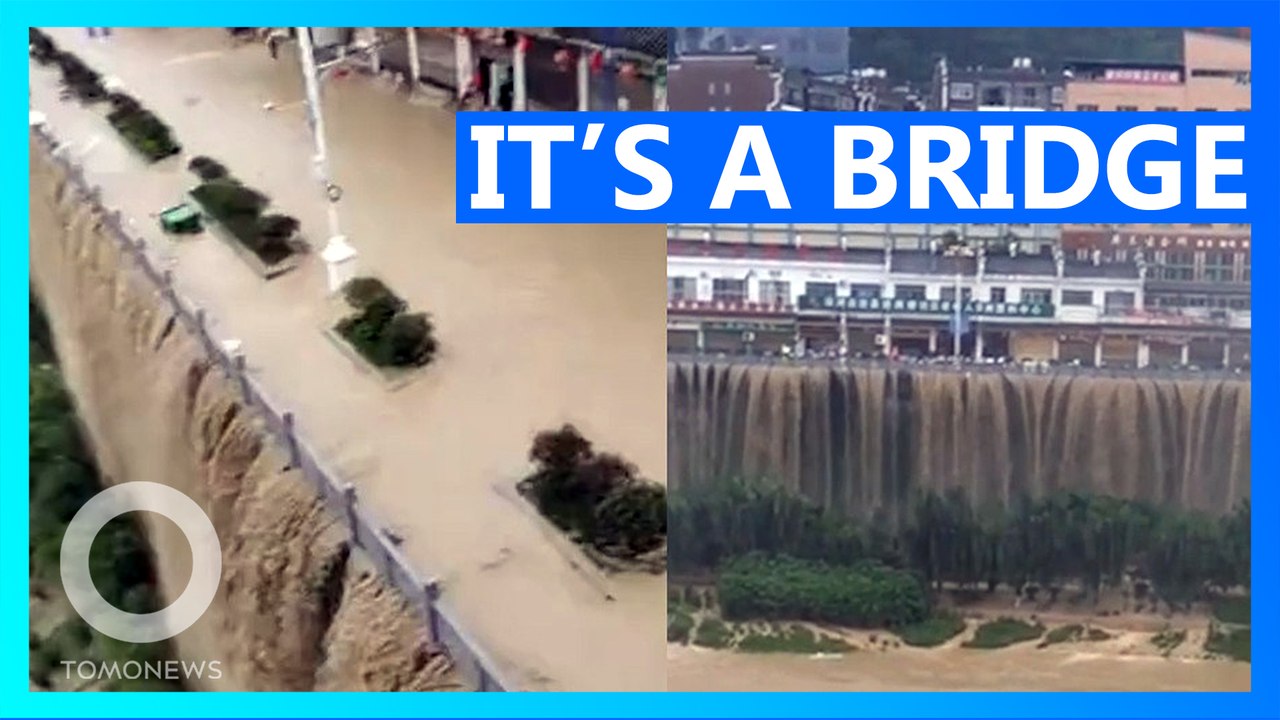 Chinese Floods Turn Bridge Into Dystopian 'Waterfall'
