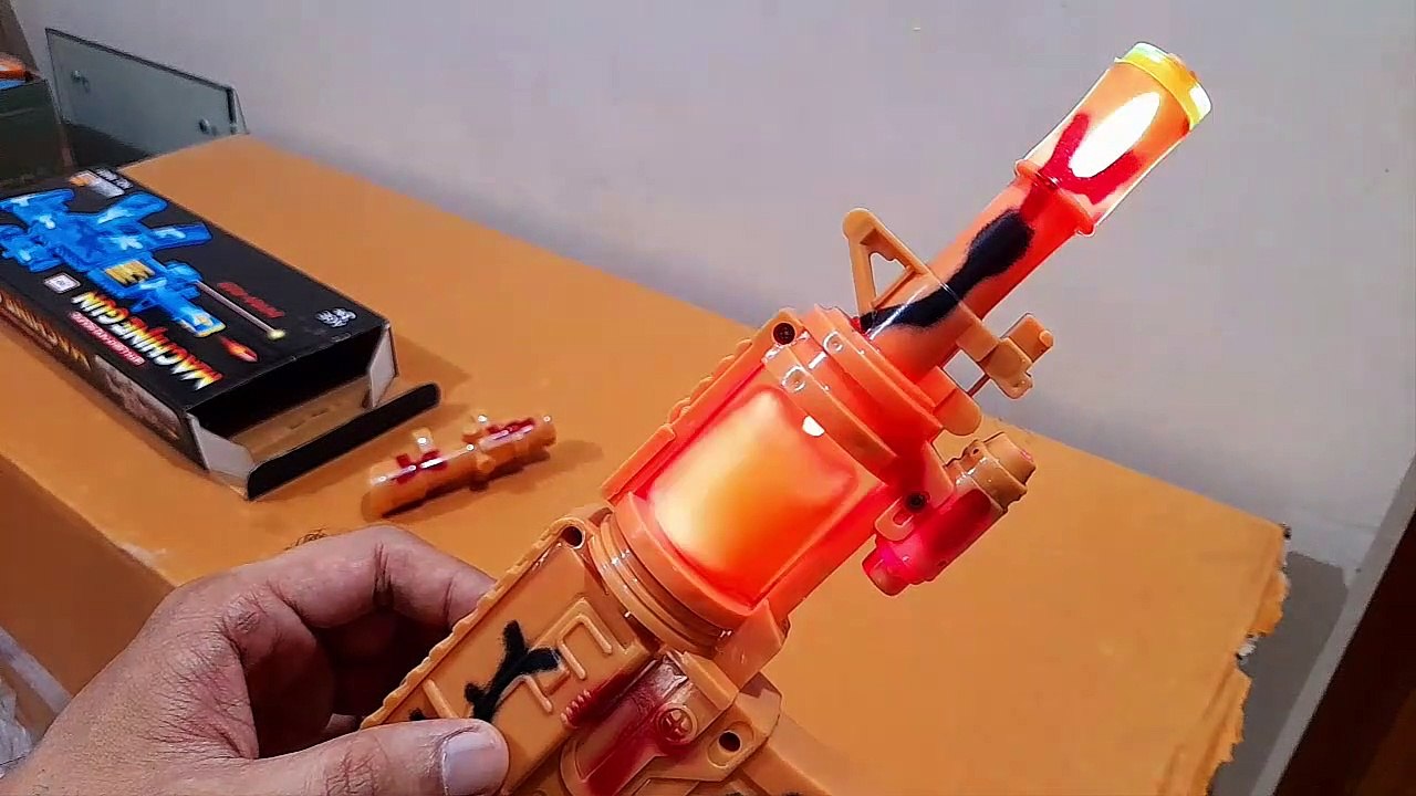 Unboxing and Review of Light music toy gun with laser light M401 for kids gift