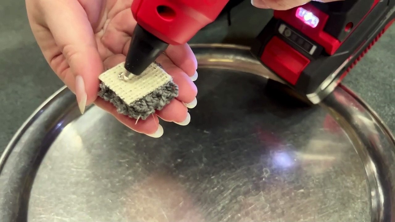 Giant mosaic of King Charles created using 3,000 tiny squares of CARPET