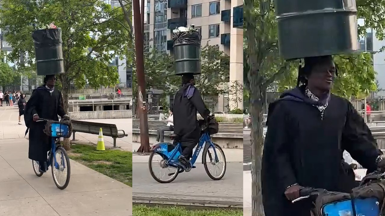 Cyclist defies PHYSICS by balancing a BIN on his HEAD!