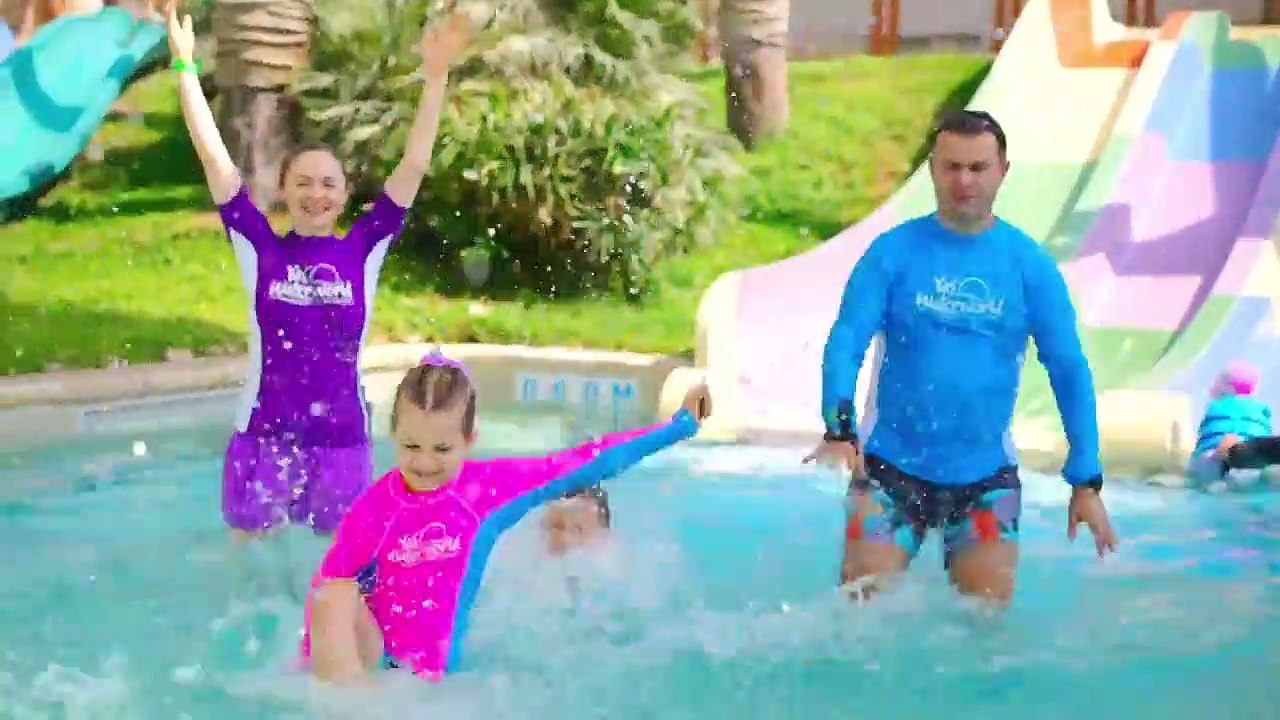 Diana is going to swim in the pool. Dad explains how to swim properly