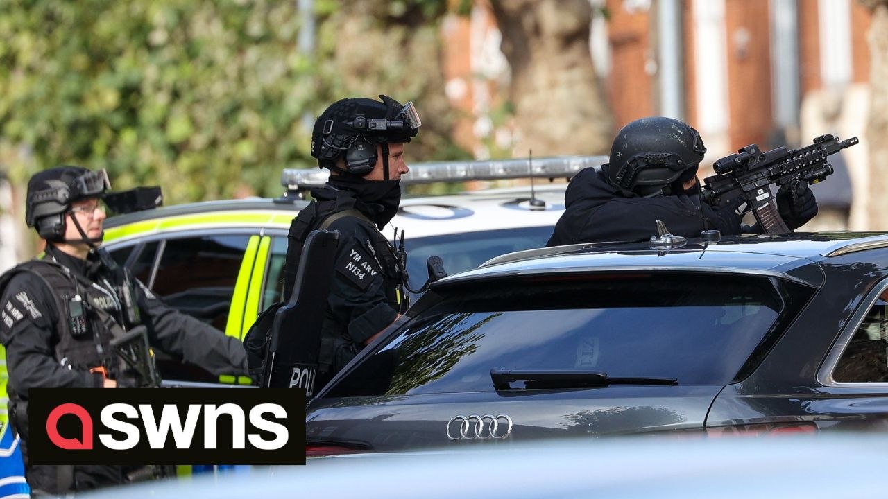 Armed police surround property after man barricades himself inside during ongoing siege in Birmingham