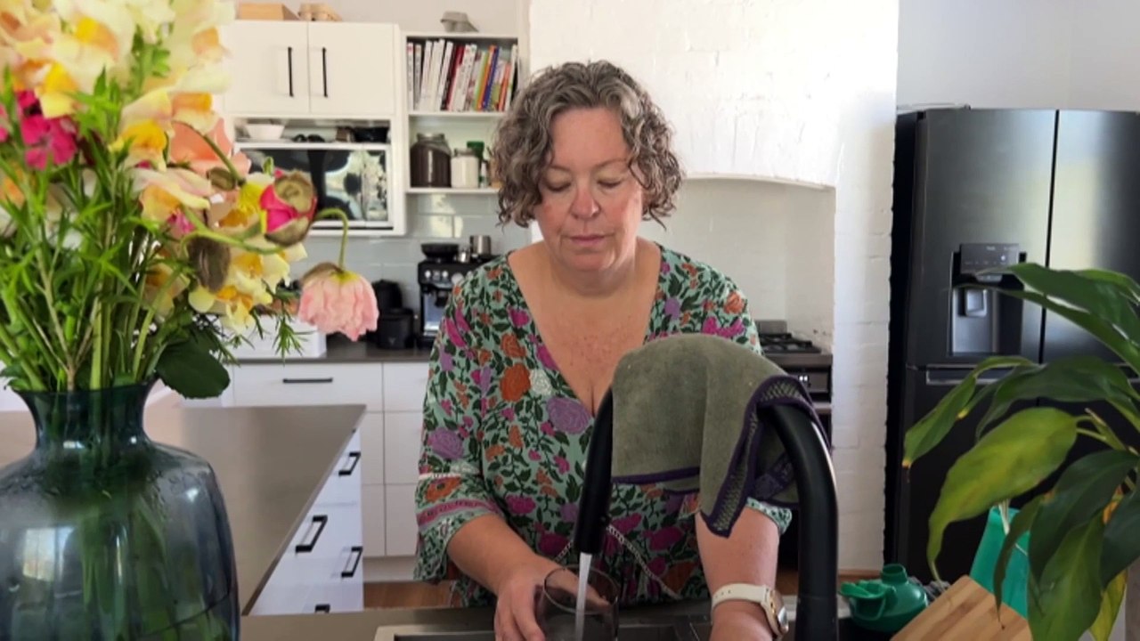 Lismore residents rally for government improvements to buyback scheme home relocations