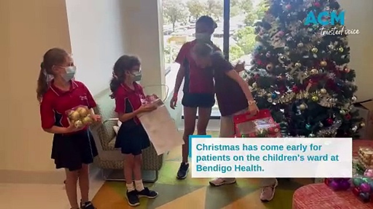 Epsom students spread the Christmas cheer to hospital's children's ward
