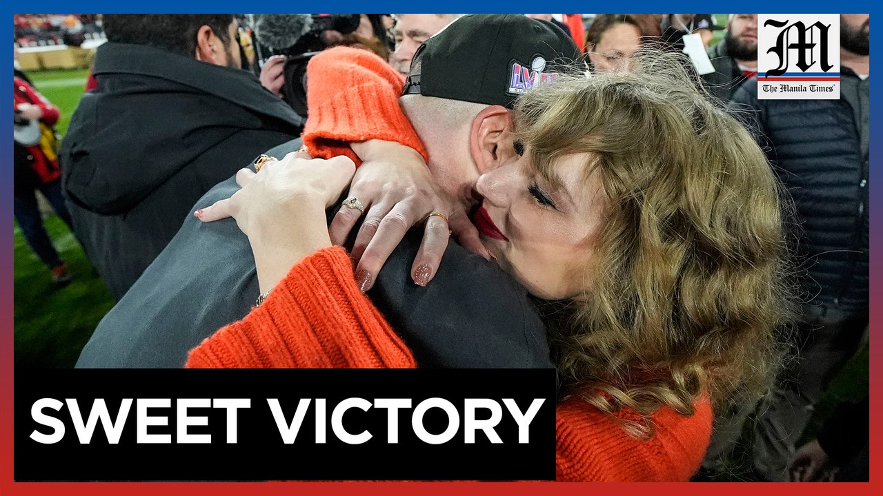 Taylor Swift kisses Travis Kelce after Chiefs' AFC win