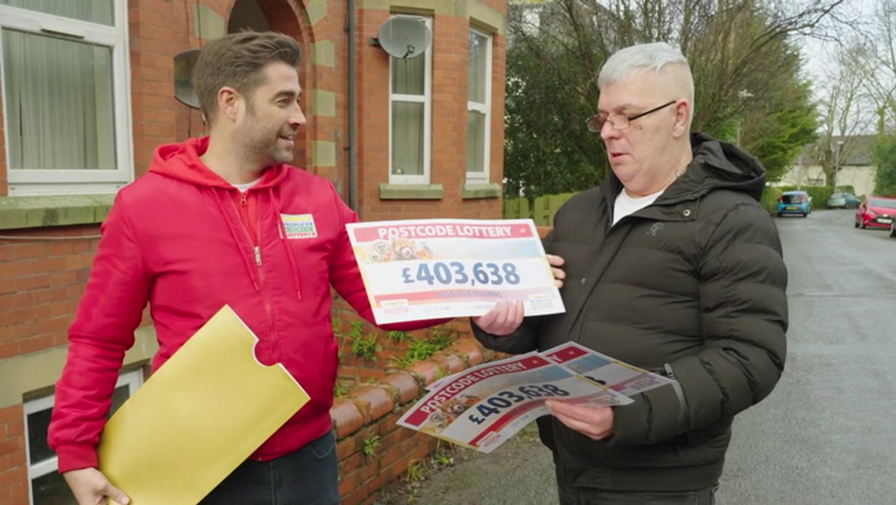 Biggest Postcode Lottery winner ‘still in shock’ as he is presented cheque