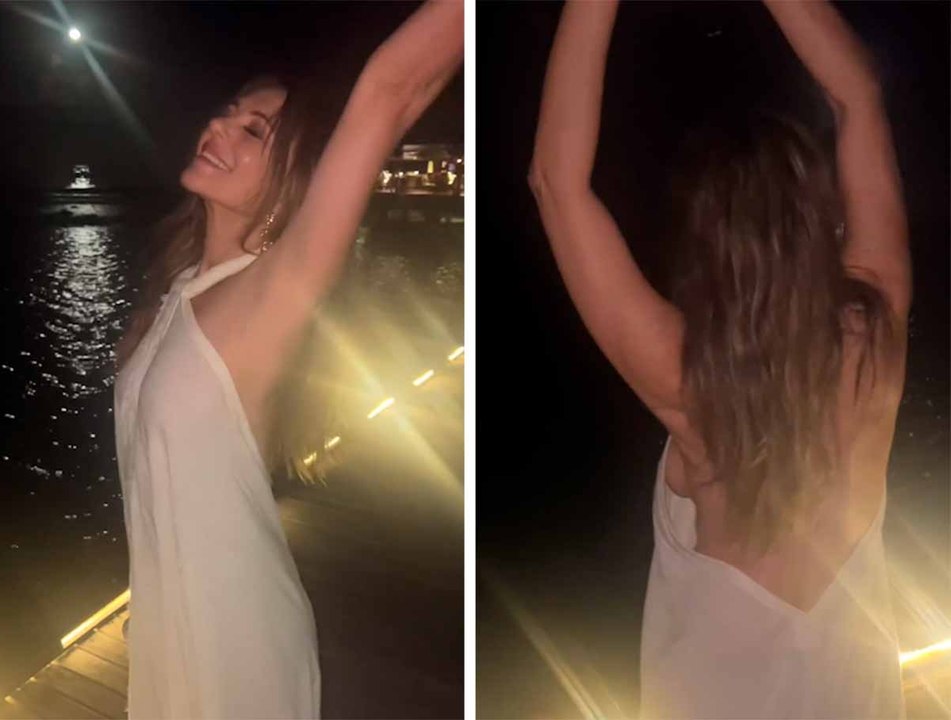 Video: Ilman alusvaatteita, Liz Hurley paljastaa yksityiskohdan liehuvassa mekossa iltakävelyllä kuunvalossa