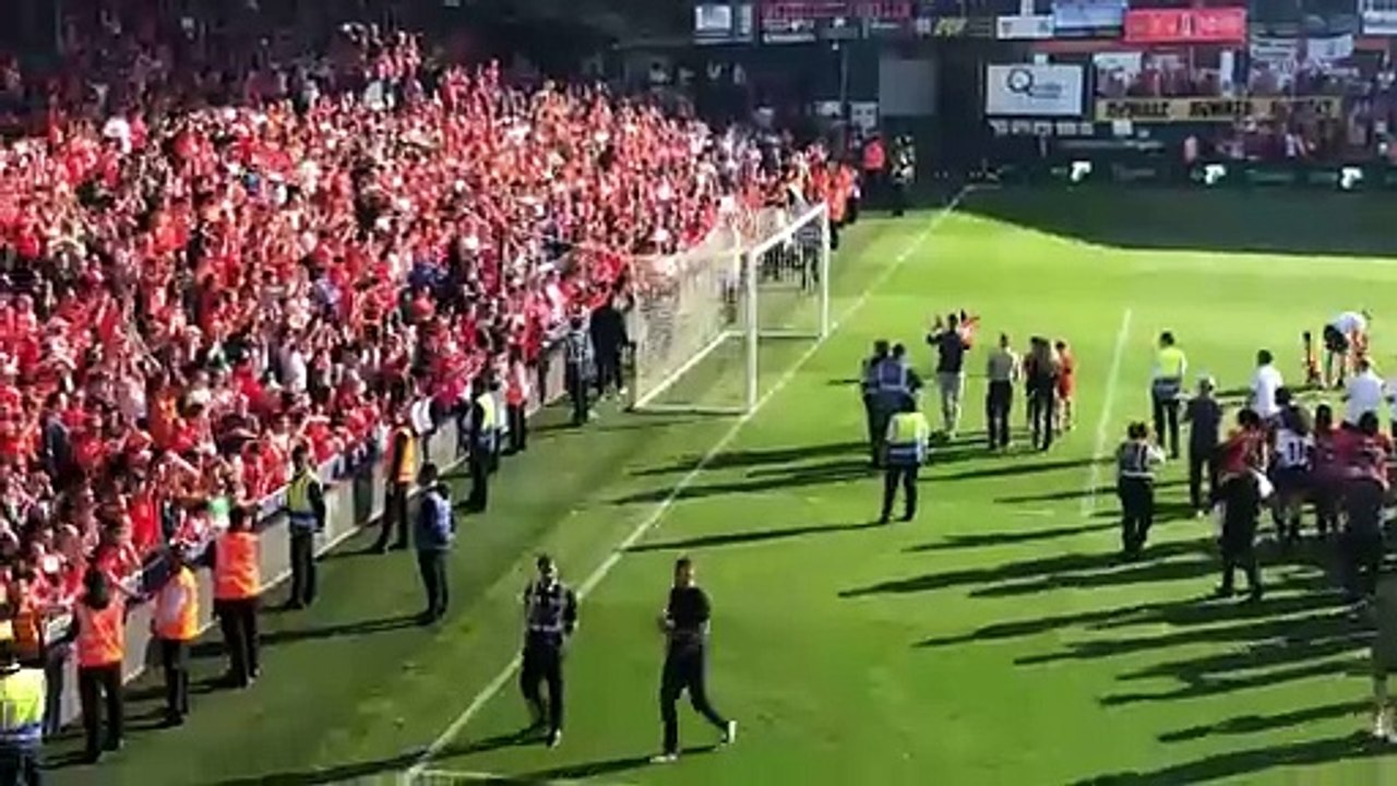 Luton boss Rob Edwards applauds the Hatters fans