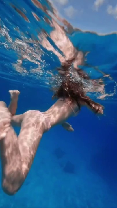 Underwater swimming girls swimming