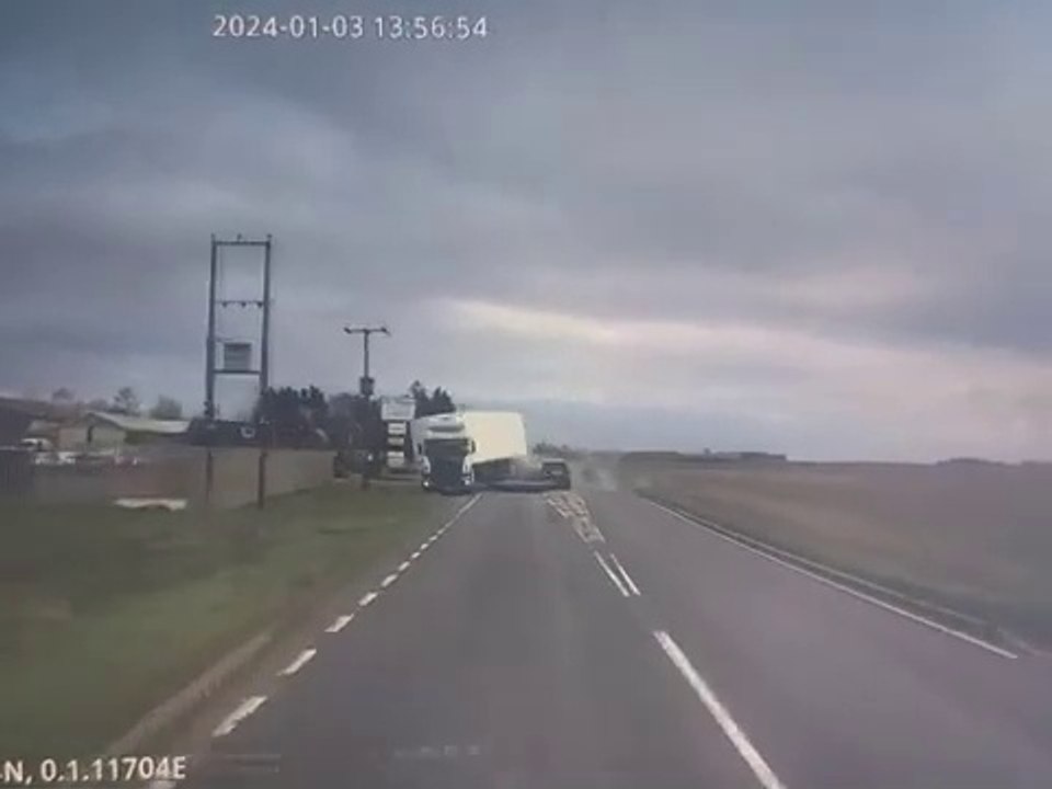 Lorry driver smashes into car after loosing control of vehicle