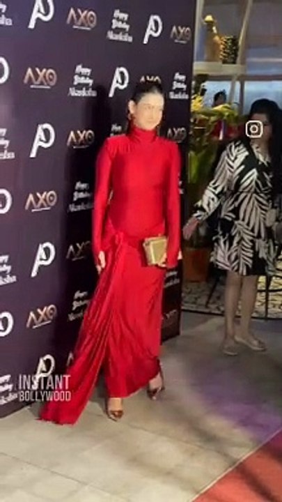 Isha Malviya stuns in a sizzling red hot dress.