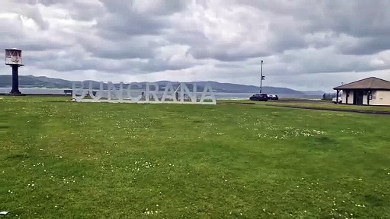 A blustery Shore Front and the 'Buncrana' sign in Buncrana, Co. Donegal