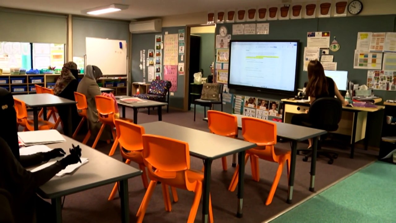 Immigrants and refugees learn new skills in Sydney school classrooms under adult education program