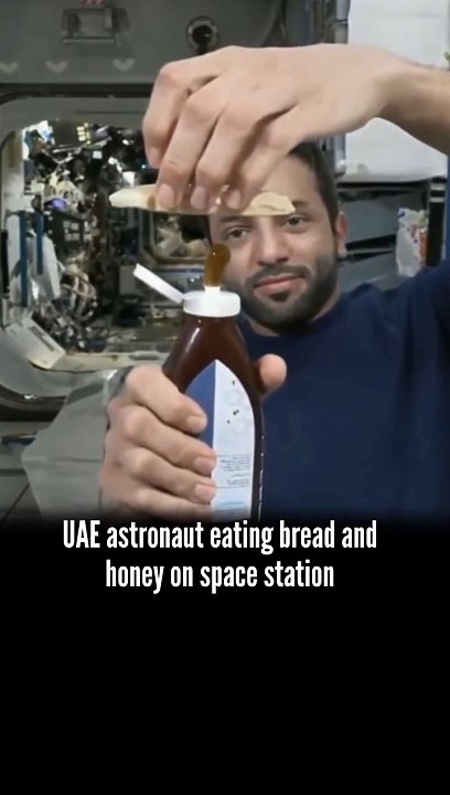 In microgravity, honey behaves differently due to its viscosity and surface tension, forming floating blobs instead of flowing down.  Astronauts must use specially designed containers to consume foods like bread and hone