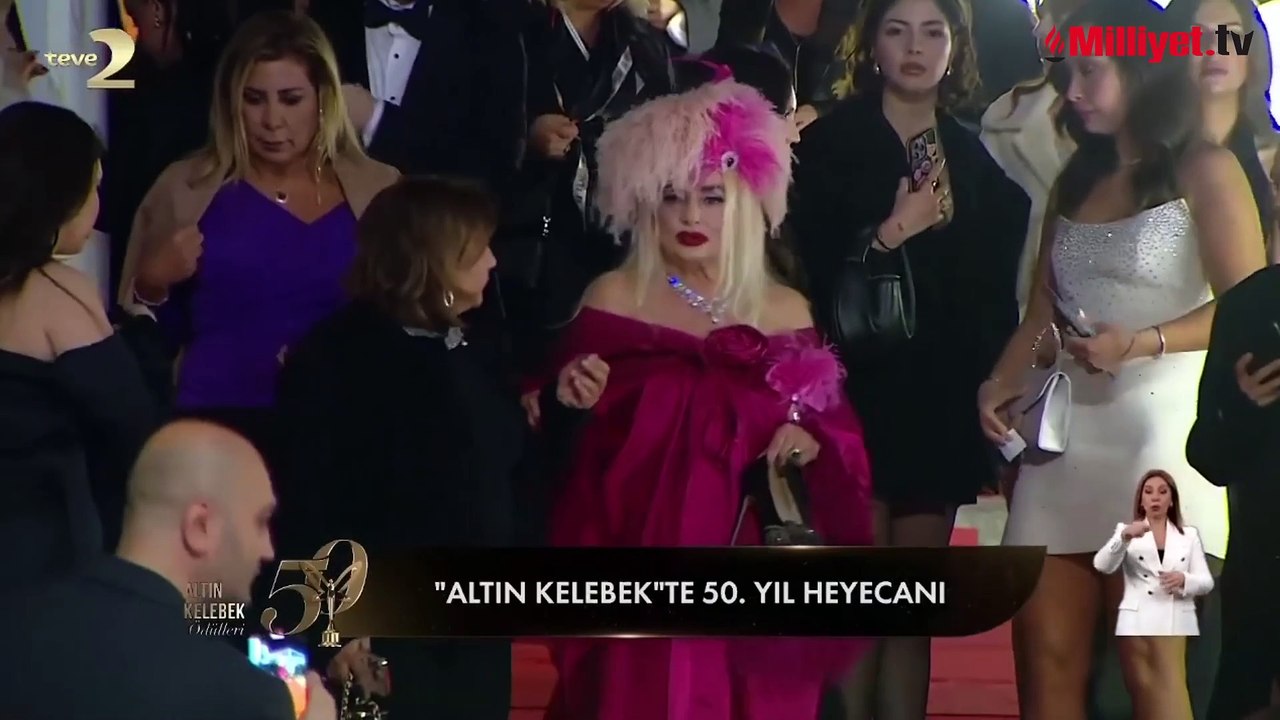 Perihan Savaş törene torunuyla birlikte katıldı.