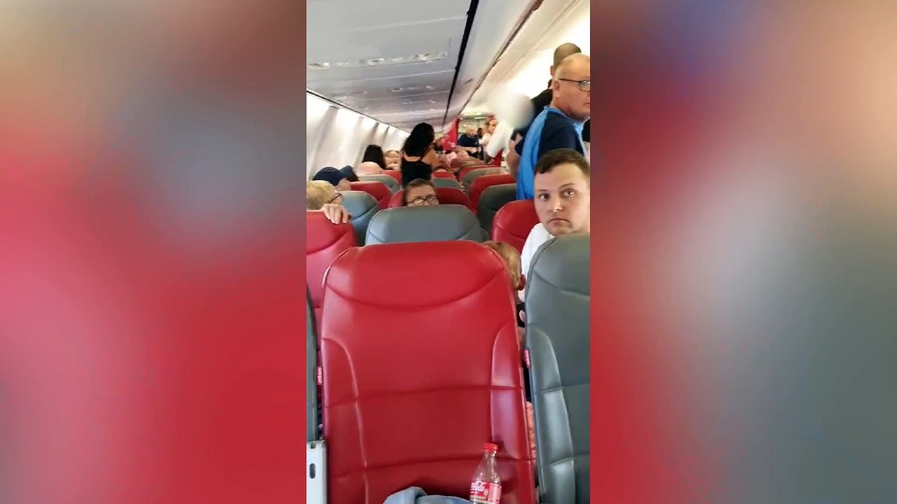 Plane fight: Passenger bites holidaymaker's neck during brawl