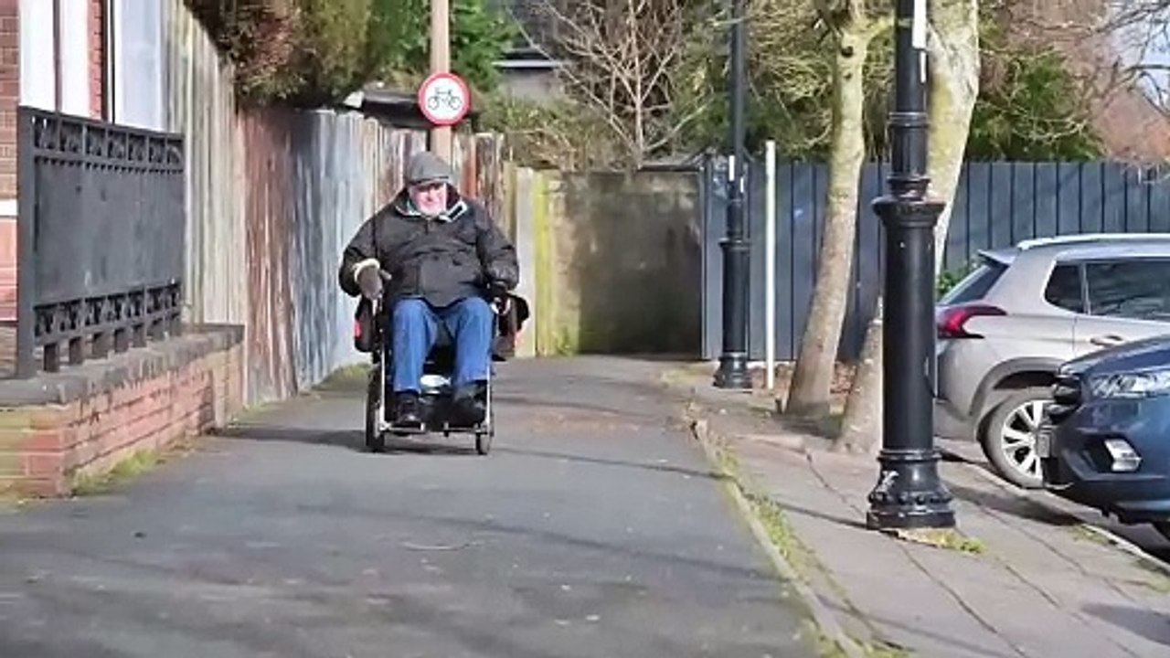 Electric wheelchair user fears being tipped over on footpath in Market Drayton