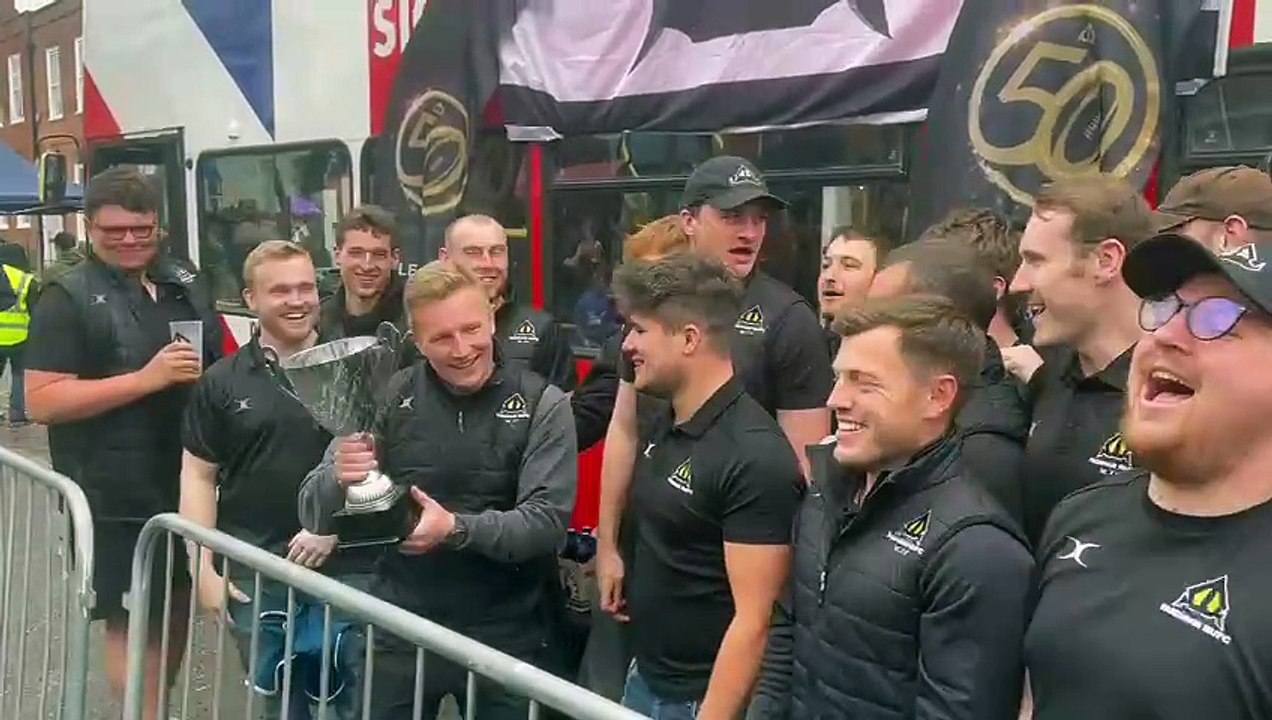 Farnham Rugby Club players celebrate their championship-winning season.