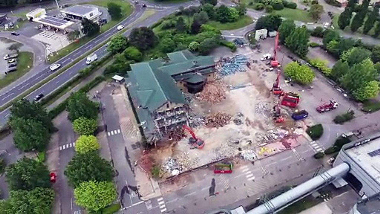 Watch as demolition works continue at iconic pagoda-style former home of The Body Shop in West Sussex