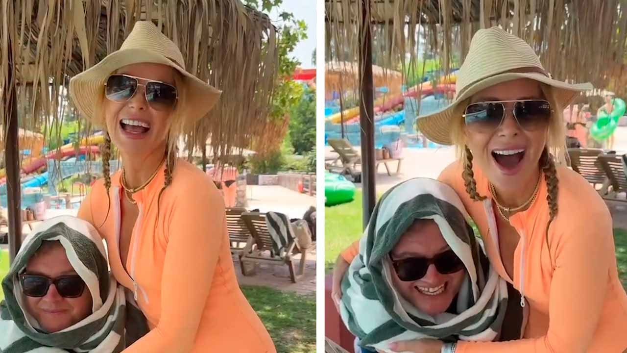 Video: Amanda Holden varastaa huomion Korfulla kuvatessaan tosi-tv:tä Alan Carrin kanssa