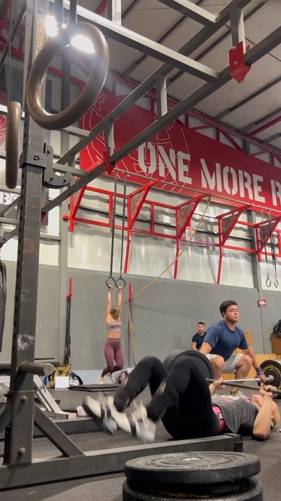 Woman Loses Balance and Falls While Lifting Weights