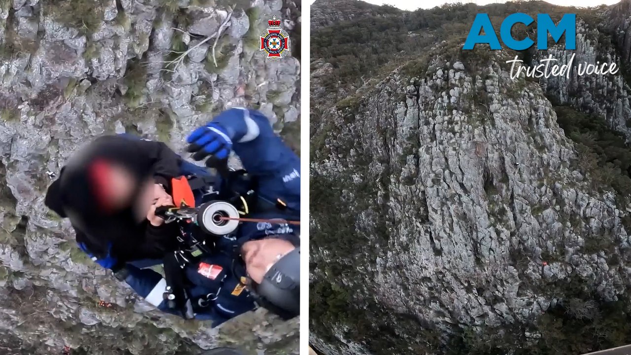 Mountain climbers winched to safety by rescue helicopter